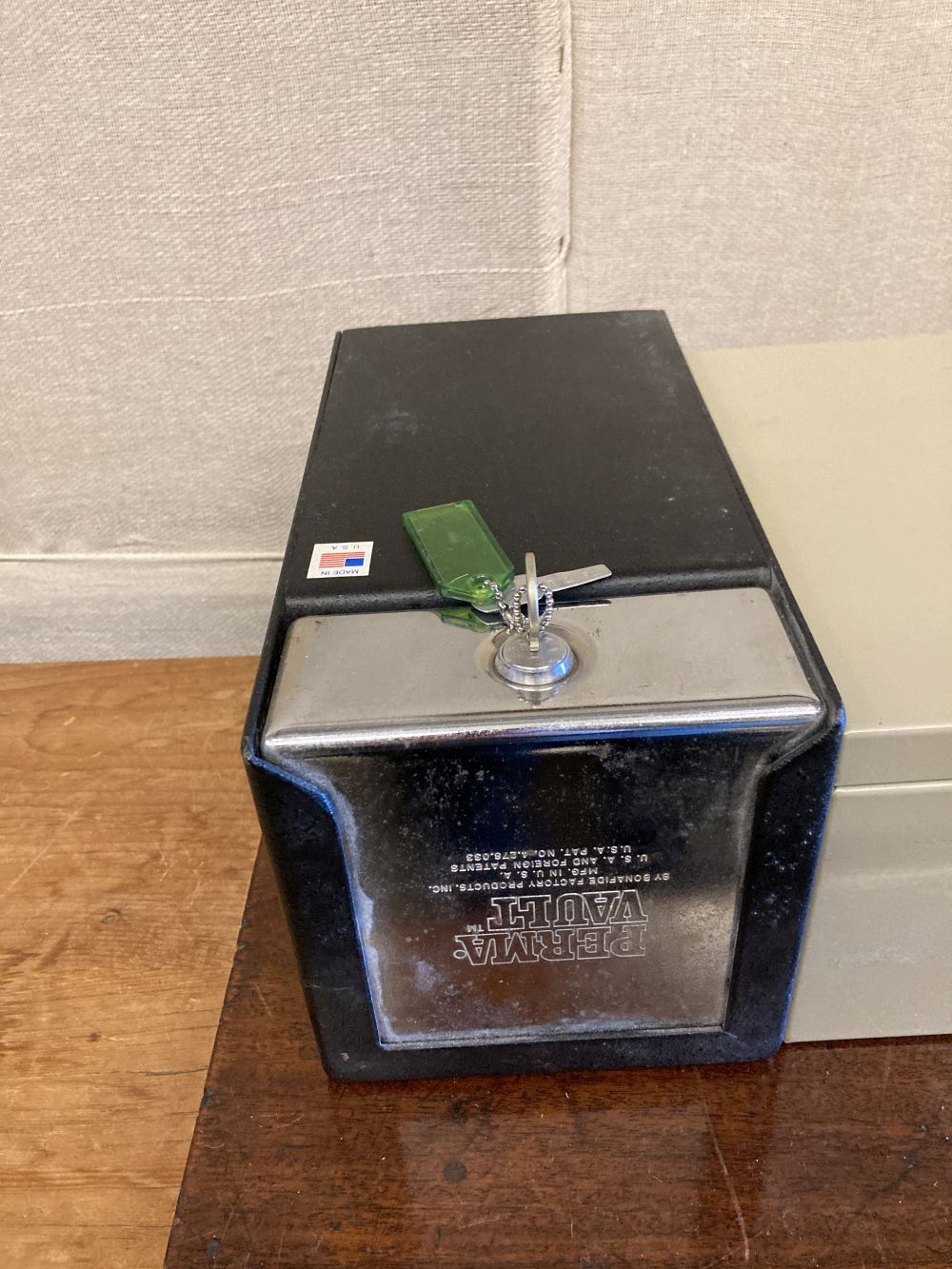 Four metal strongboxes and a document box
